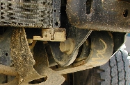 AC condenser bracket in the way of the front spring bolt